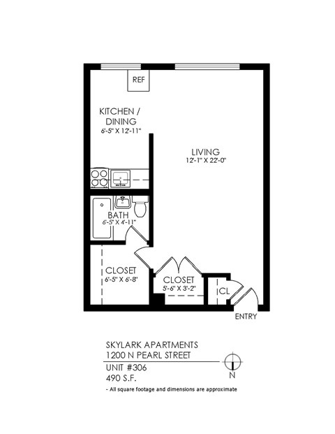 A floor plan of an apartment with a kitchen, dining area, bathroom, closet, and living room.